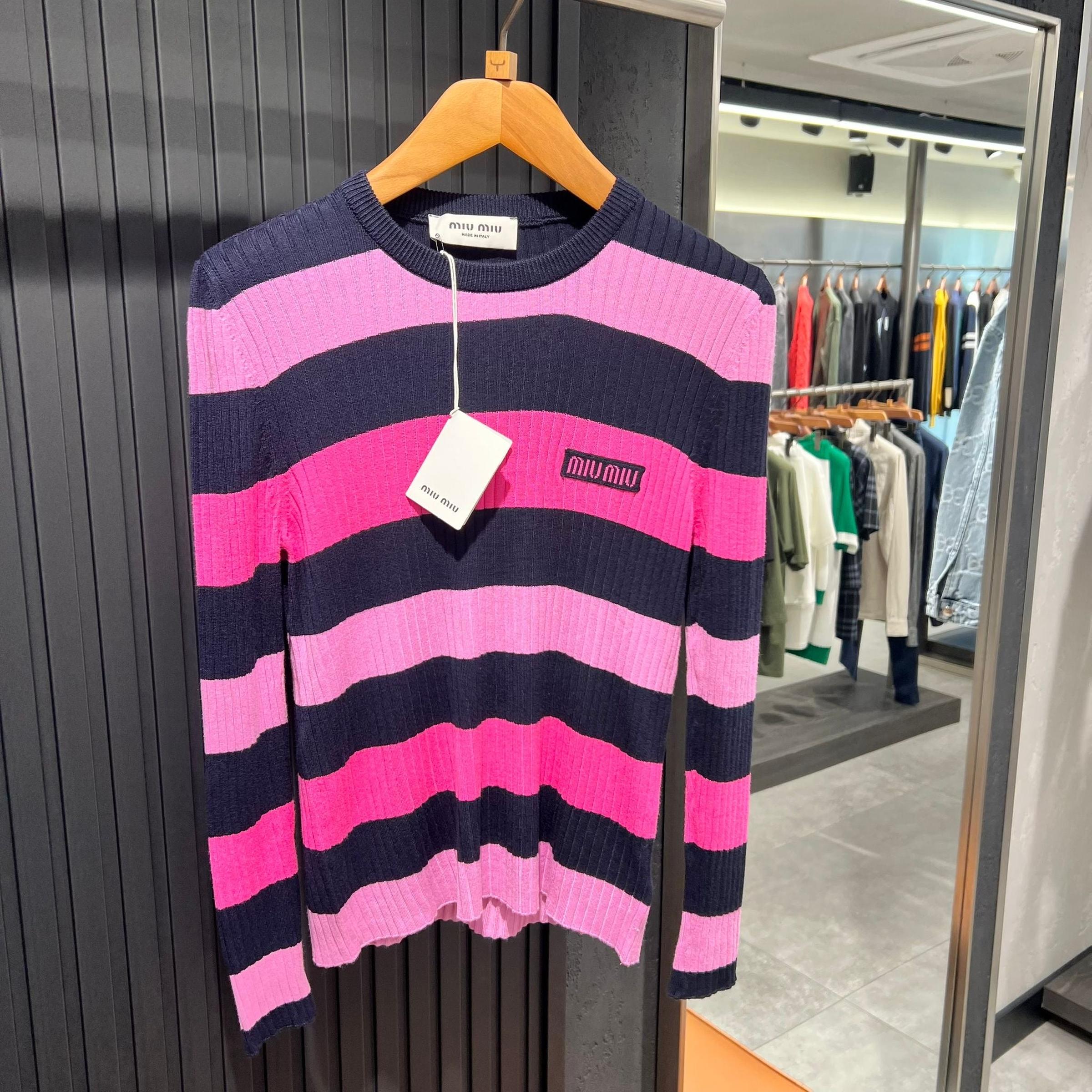 Pleteni pulover za žene roze boje