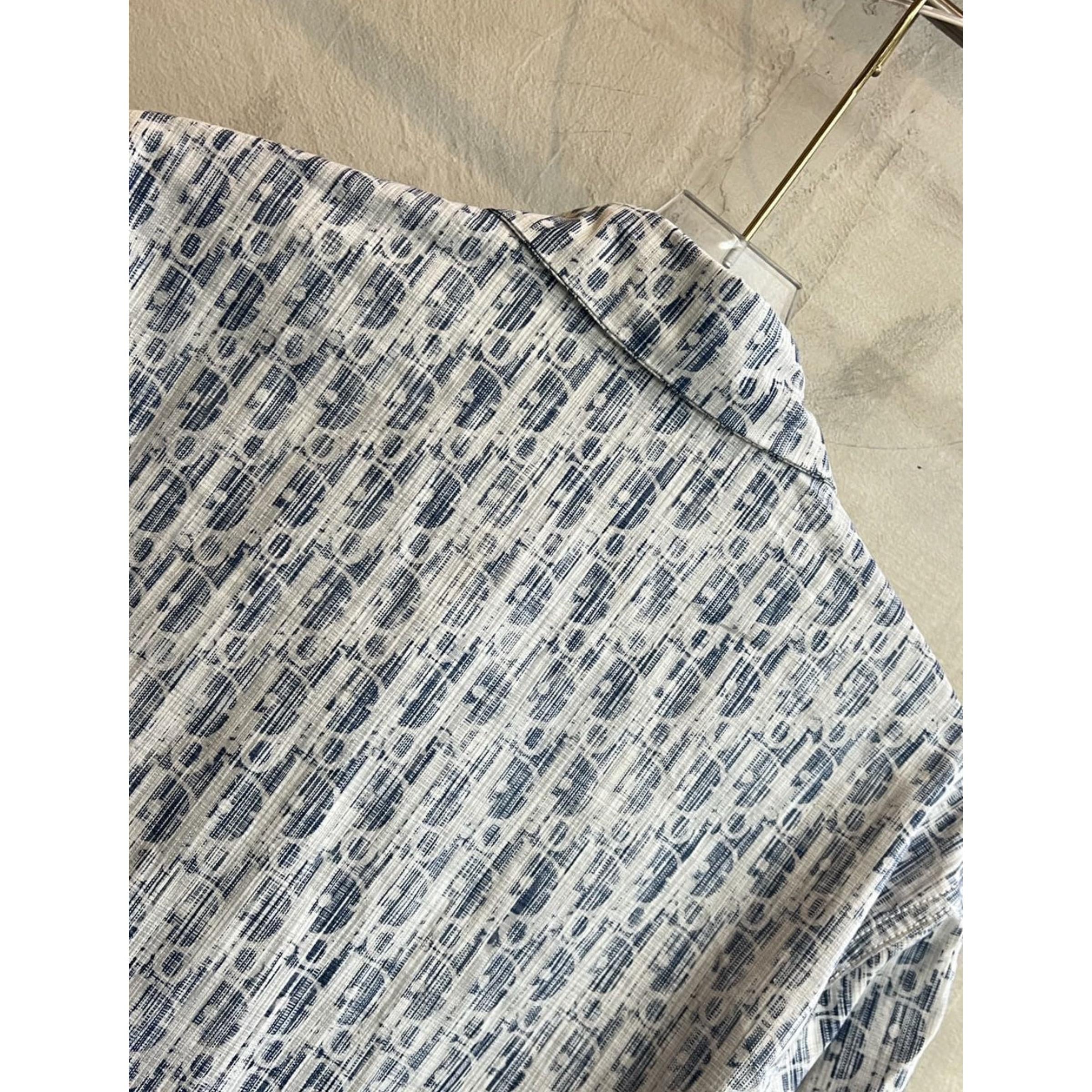 Modrá monogramová košile