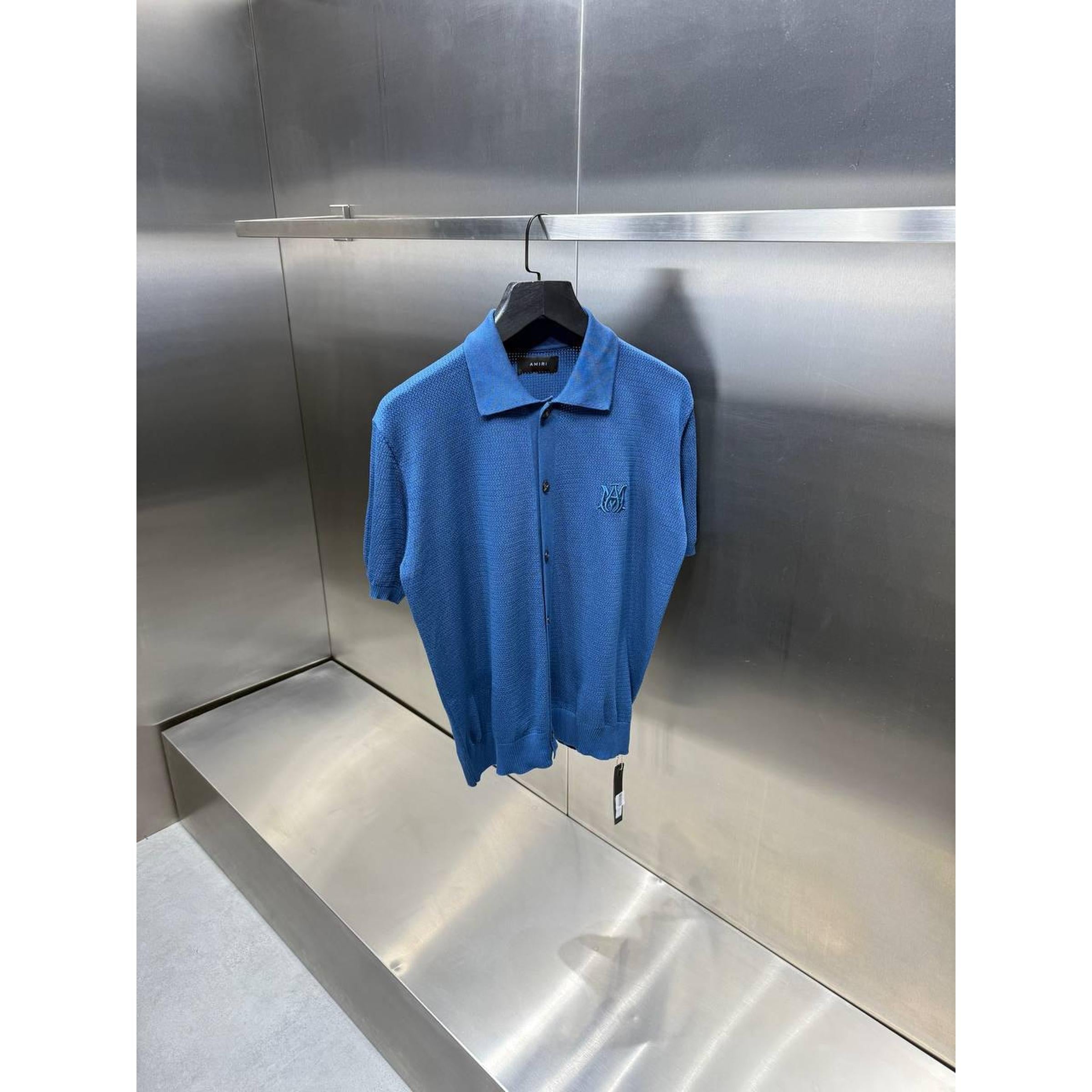 Tamnoplava pletena polo majica