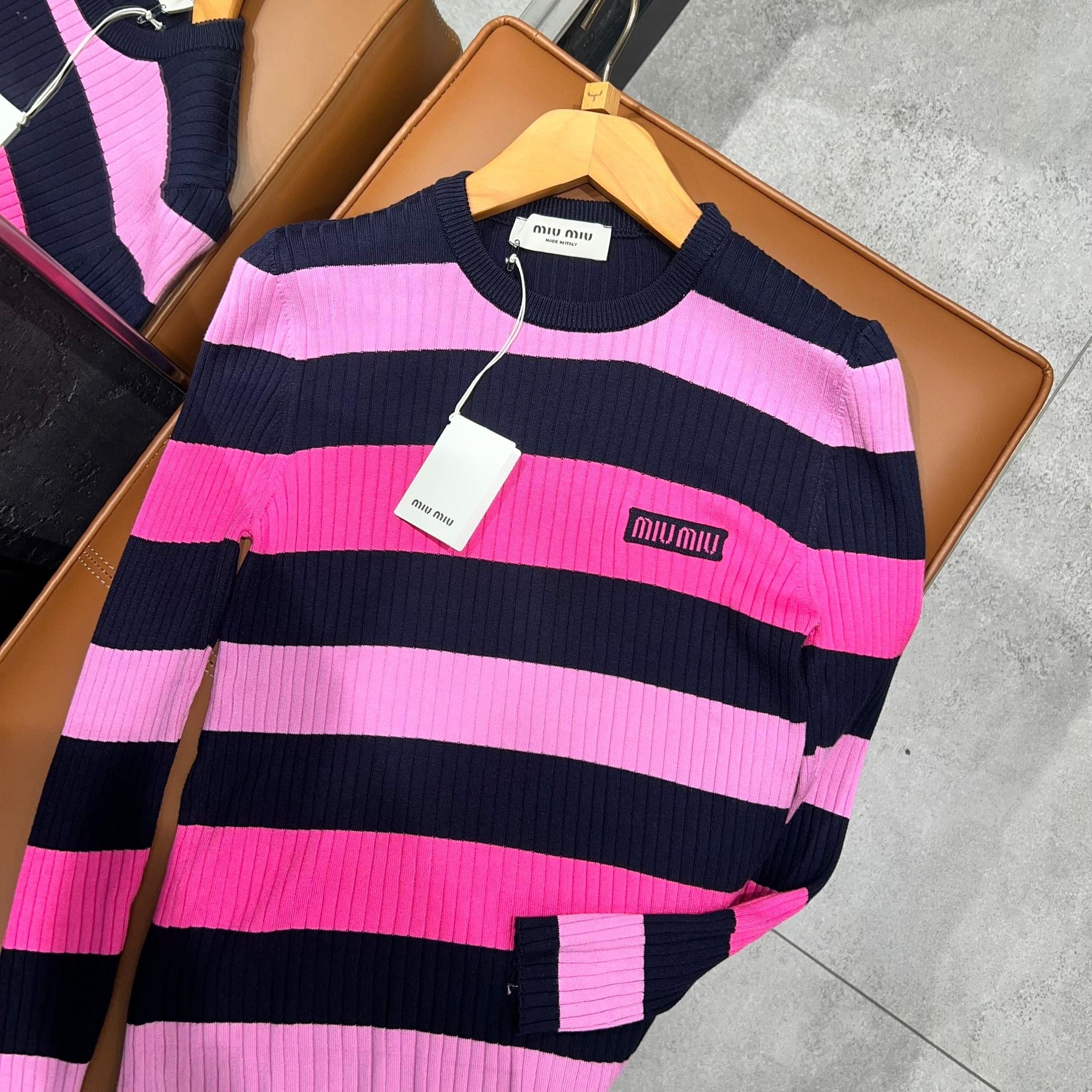 Pleteni pulover za žene roze boje