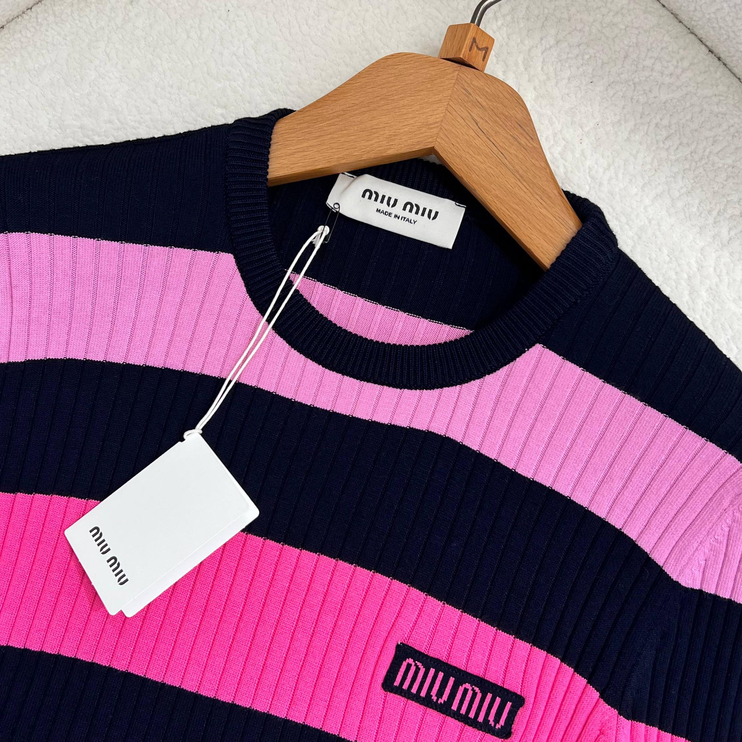 Pleteni pulover za žene roze boje