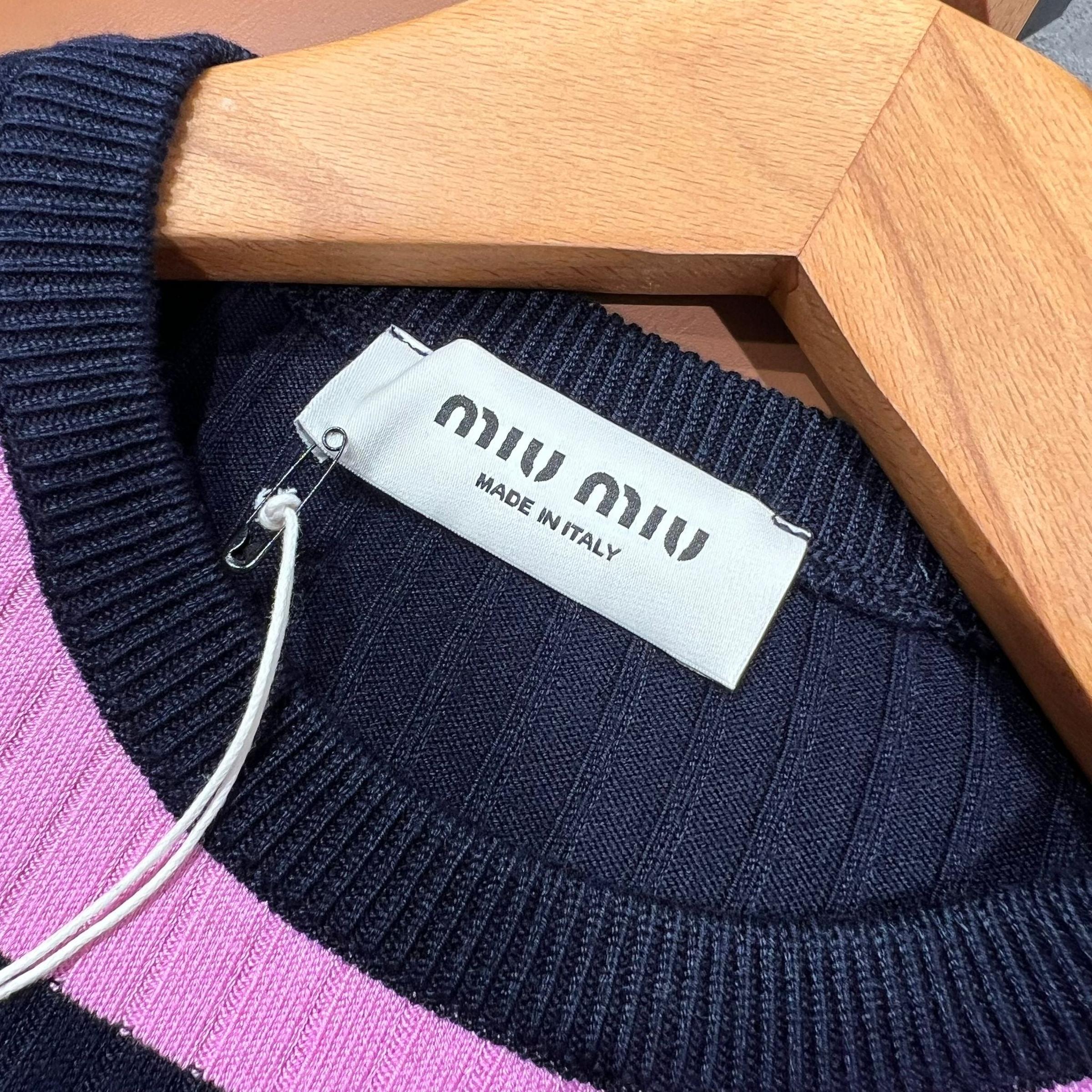 Pleteni pulover za žene roze boje