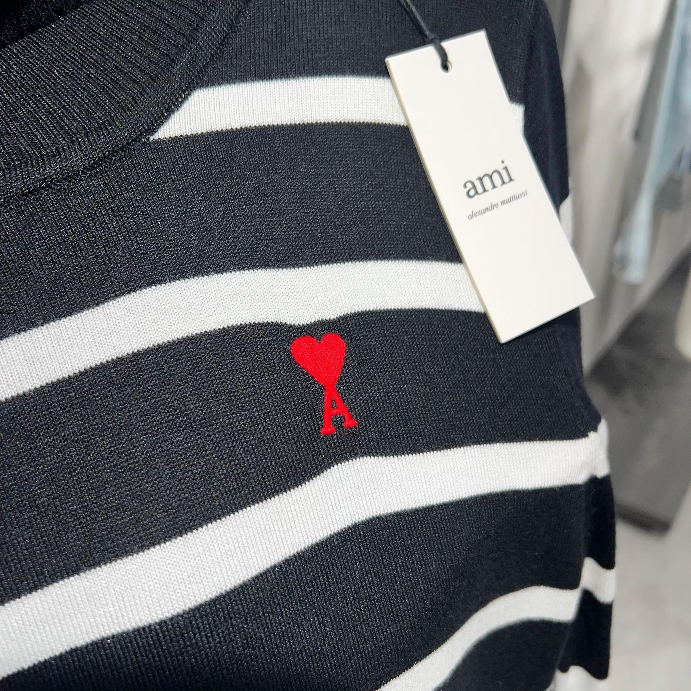 Crno-bijeli ženski pleteni polo pulover