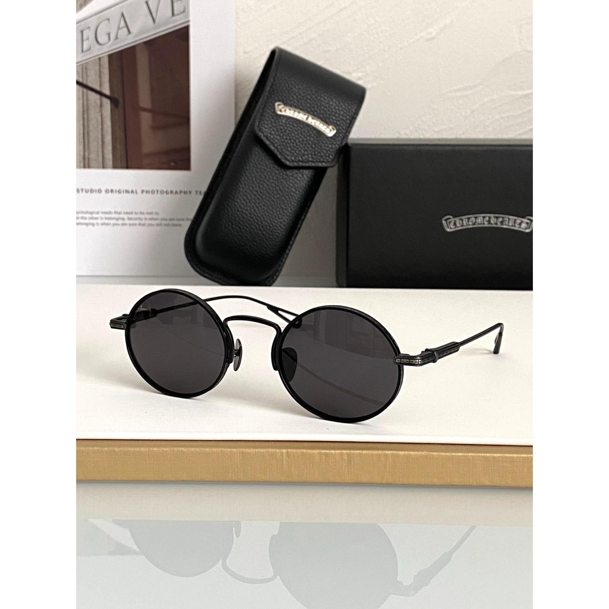 Černé sluneční brýle s černými obroučkami