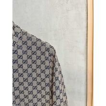 Béžová monogramová bomber bunda