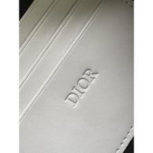 Siva monogram torbica od prave kože