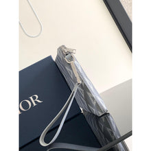 Siva monogram torbica od prave kože