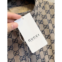 Béžová monogramová bomber bunda