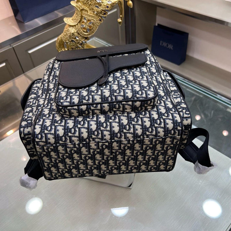 Monogram Saddle Backpack