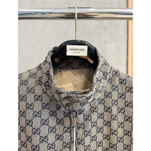 Béžová monogramová bomber bunda