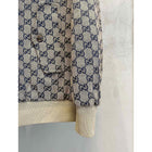 Béžová monogramová bomber bunda