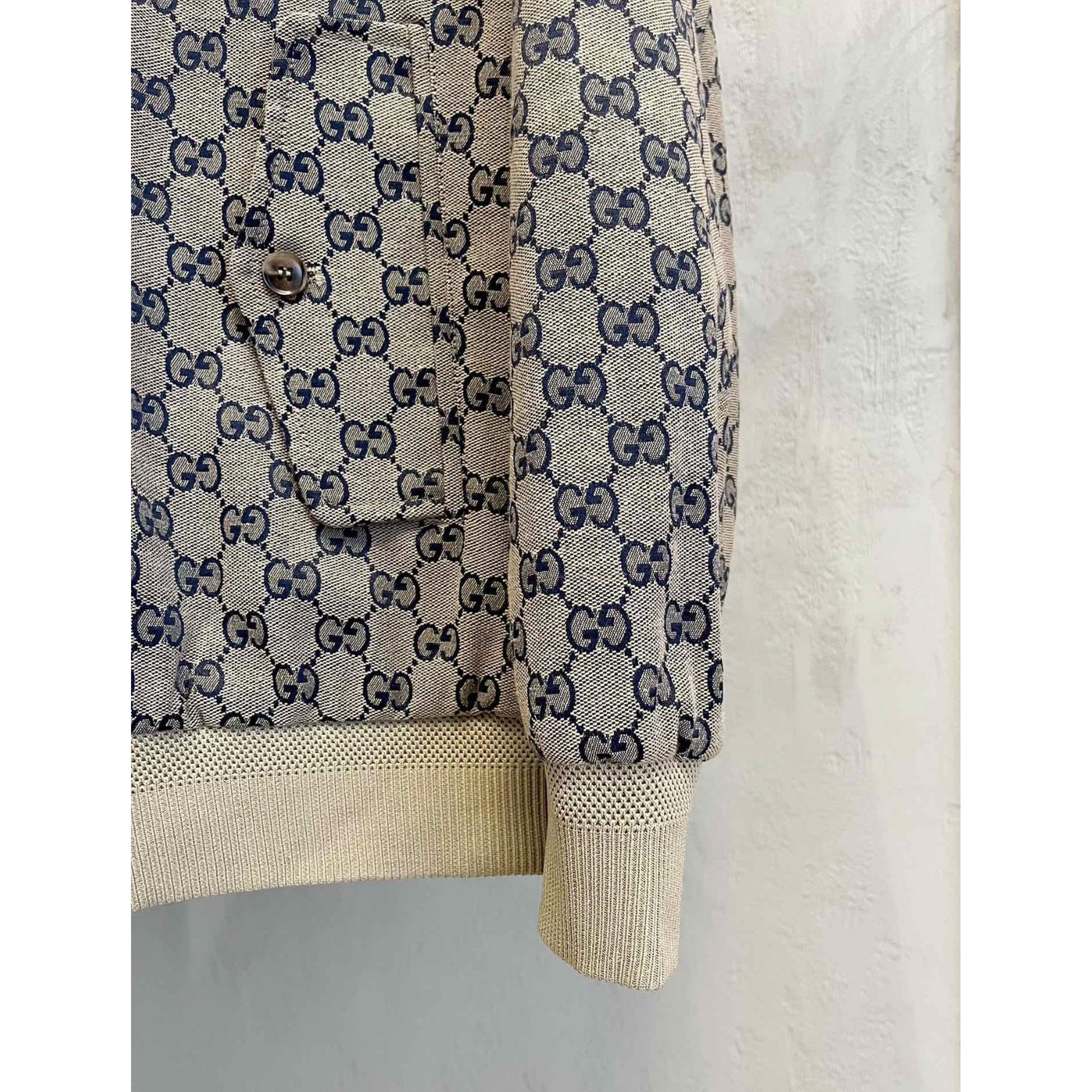 Béžová monogramová bomber bunda
