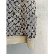 Béžová monogramová bomber bunda