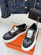Black Monogram Sneakers